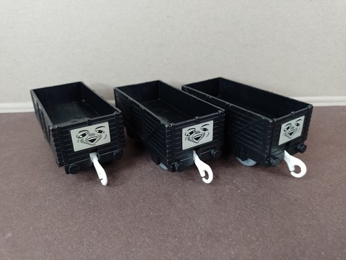 Three black troublesome trucks - troublesome,
