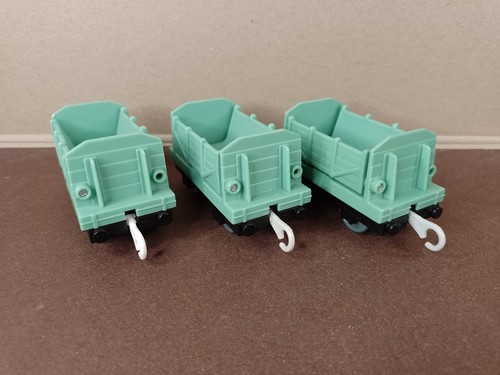 Three tipper trucks - three,