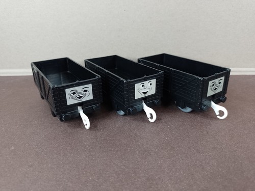 Three black troublesome trucks - three,